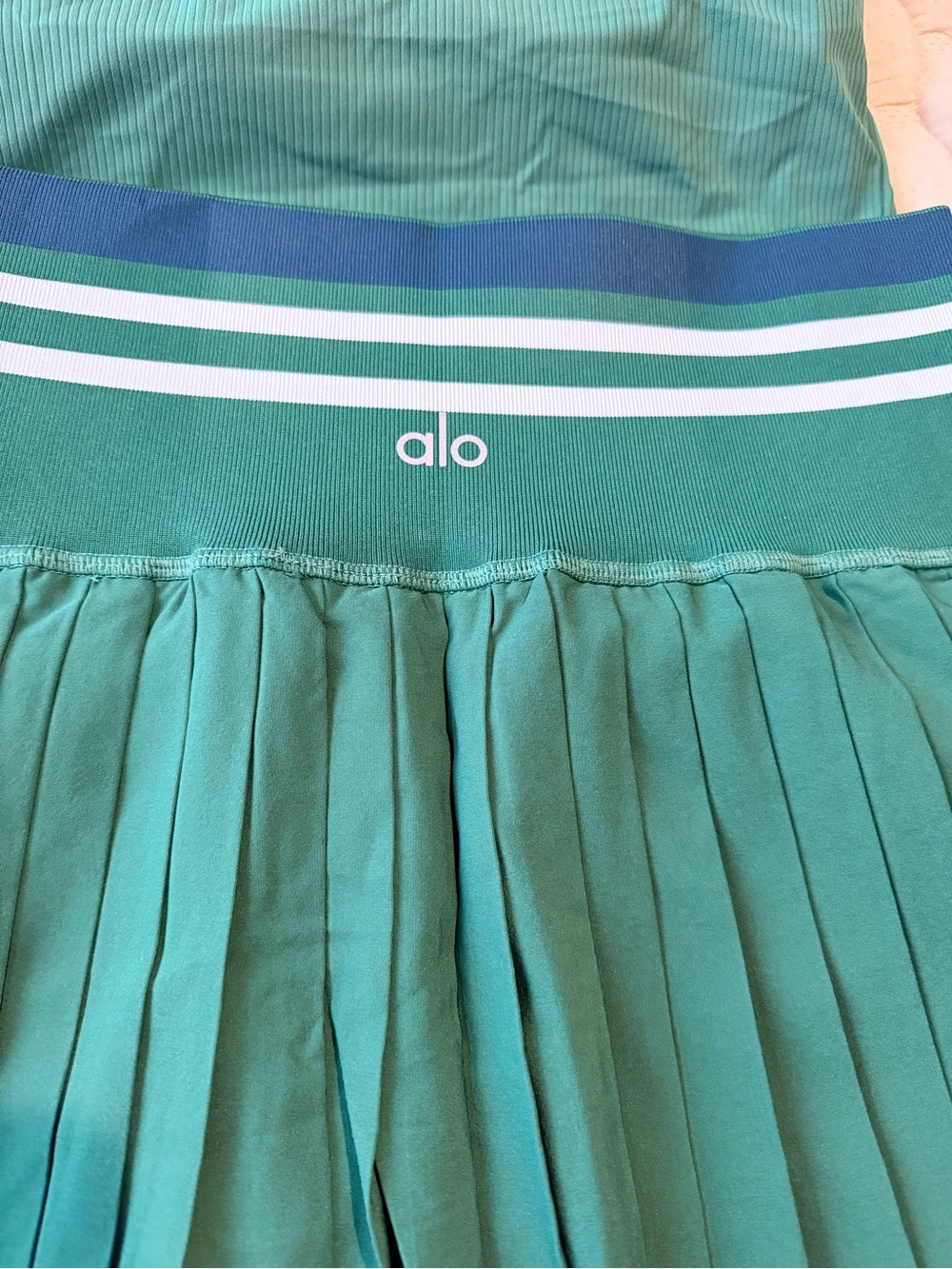 ALO Yoga Green Pleated Polo Set with White Striped Waistband - Picture 3 of 4